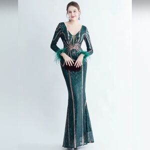 Elegant Green Mermaid Gown with Plunge Neckline
